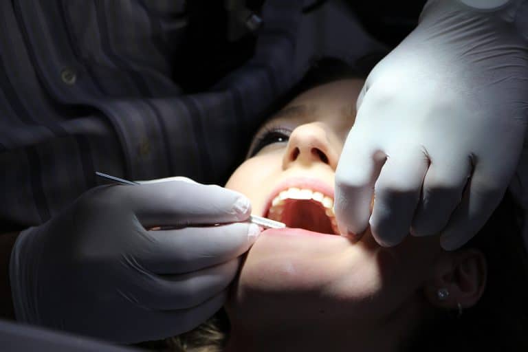 A girl undergoing a dental procedure